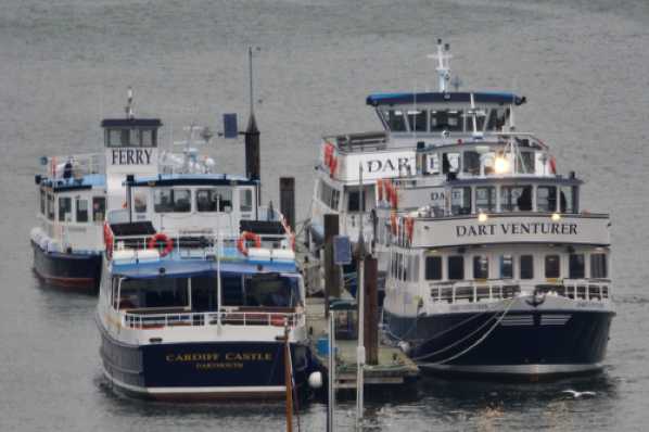 19 March 2020 - 11-10-49 
No tourists. So........
Most of the Riverlink ferries are tied up including  Dart Venturer with 'headlights' on.  (why ?) Plus Cardiff Castle, Dart Explorer, Dartmouth Castle and Kingswear Princess (back left)
------------
Dartmouth Riverboat Company ferries